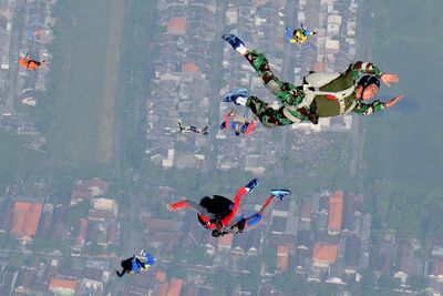 High angle view of soldiers skydiving