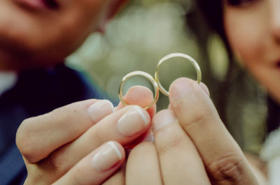 Close-up of hand holding hands