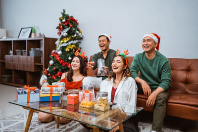Friends sitting on table