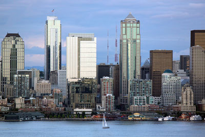 Modern buildings in city against sky