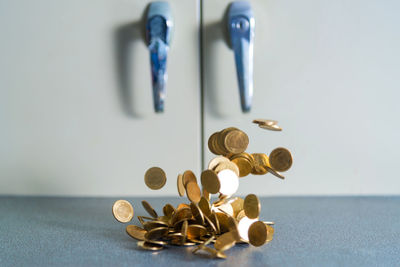 Close-up of coins on table
