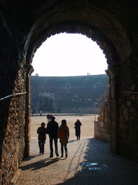 People walking in tunnel