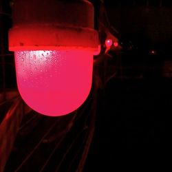 Close-up of red light bulb