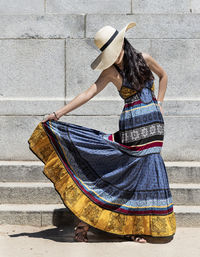 Rear view of woman wearing hat