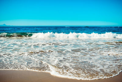 Scenic view of sea against clear sky