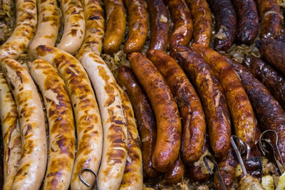 Full frame shot of meat on barbecue grill