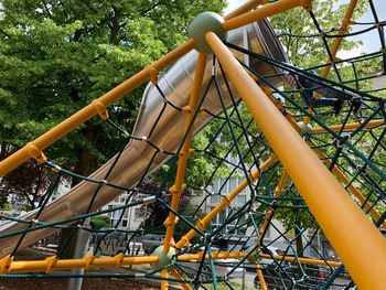 Low angle view of metallic structure in park