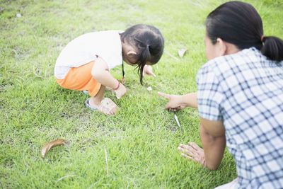 High angle view of boy playing on field