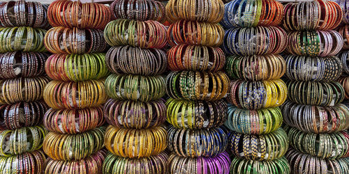 Full frame shot of multi colored bangles for sale