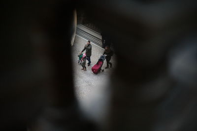 High angle view of people walking on street