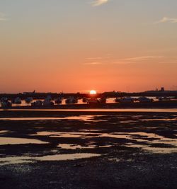 Scenic view of sunset over city