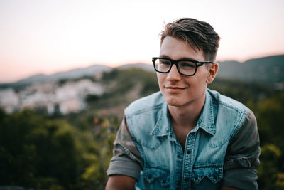 Close-up of man wearing eyeglasses