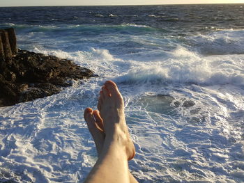 Low section of person at beach