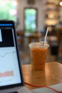 Close-up of drink served on table