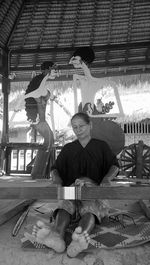 Young man sitting outdoors