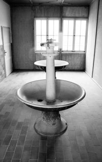 Close-up of faucet in bathroom