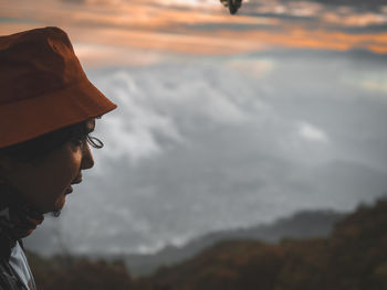 Portrait of man with sunglasses against sky