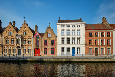 View of buildings against cloudy sky