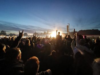 Crowd at concert during dusk