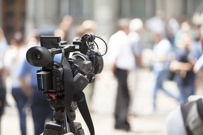 Close-up of television camera on tripod