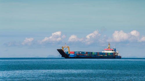 Ship in sea against sky