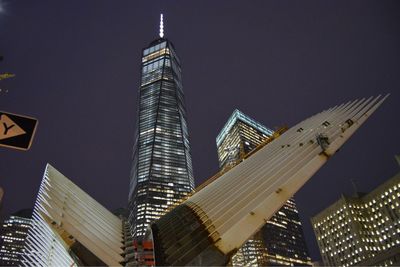 Low angle view of office building at night