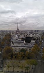 High angle view of cityscape against cloudy sky