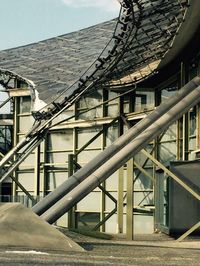 Staircase by building against sky