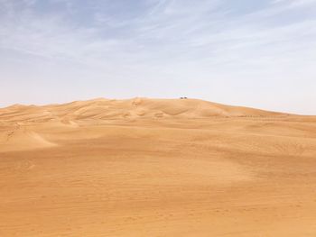 Scenic view of desert against sky