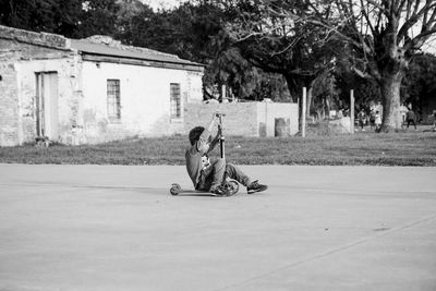 Child with his scooter