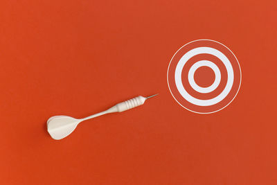 High angle view of toothbrush against yellow background