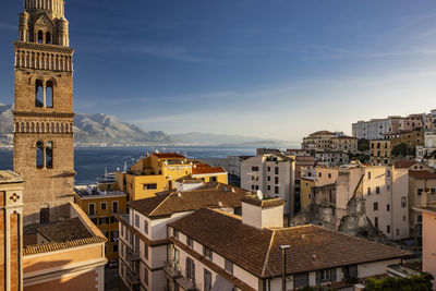 Buildings in city against sky