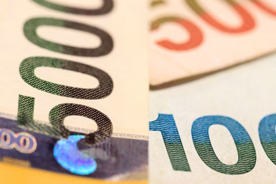 Close-up of coins on table