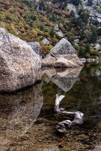 Scenic view of rocks in lake