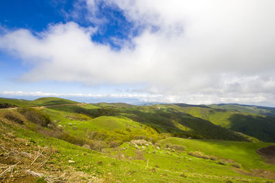 Mountain landscape in georgia. landscape from didgori road. clouds and blue sky.