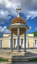 Gazebo by building against sky