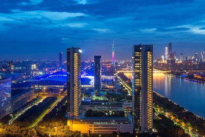 Illuminated buildings in city at night