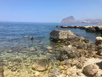 Scenic view of sea against clear sky