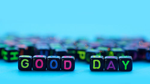 Close-up of good day text on blocks