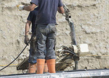 Construction worker at a building site, employee in construction industry