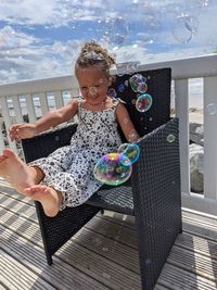 High angle view of woman with bubbles