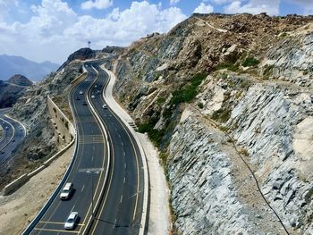 High angle view of road amidst mountains going up the mountain to taif city in saudi arabia