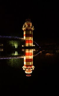 Bridge over river at night