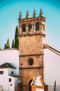 Low angle view of historic building against clear sky