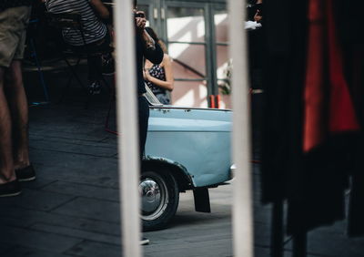 Reflection of classic car on mirror