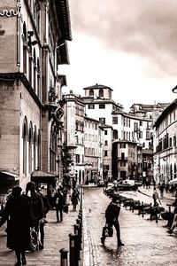 People walking on city street