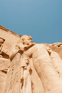 Low angle view of statue against sky