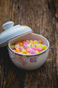 Close-up of pink flowers in bowl on table