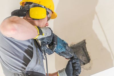 Midsection of man working at construction site