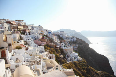 High angle view of townscape against sea